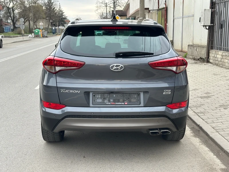 Hyundai Tucson 2.0 CRDI /4x4/Кожа/Панорама/Автоматик/ШВЕЙЦАРИЯ, снимка 4 - Автомобили и джипове - 52473431
