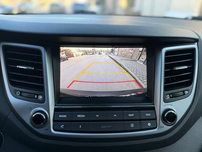 Hyundai Tucson 2.0 CRDI /4x4/Кожа/Панорама/Автоматик/ШВЕЙЦАРИЯ, снимка 14 - Автомобили и джипове - 52473431