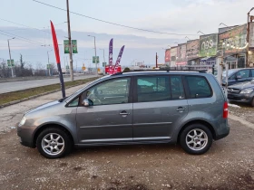 VW Touran 1.9 tdi 105ps navi - 6600 лв. - 34057912 | Car24.bg