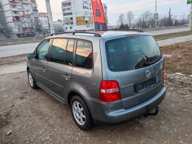 VW Touran 1.9 tdi 105ps navi - 6600 лв. - 34057912 | Car24.bg