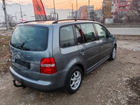 VW Touran 1.9 tdi 105ps navi - 6600 лв. - 34057912 | Car24.bg