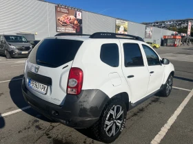 Обява за продажба на Dacia Duster 1.6 16v N1 4x4 * ФАБРИЧНА ГАЗ*  ~10 900 лв. - изображение 4 | Auto.bg Обява за продажба на Dacia Duster 1.6 16v N1 4x4 * ФАБРИЧНА ГАЗ*  ~10 900 лв. - изображение 4
