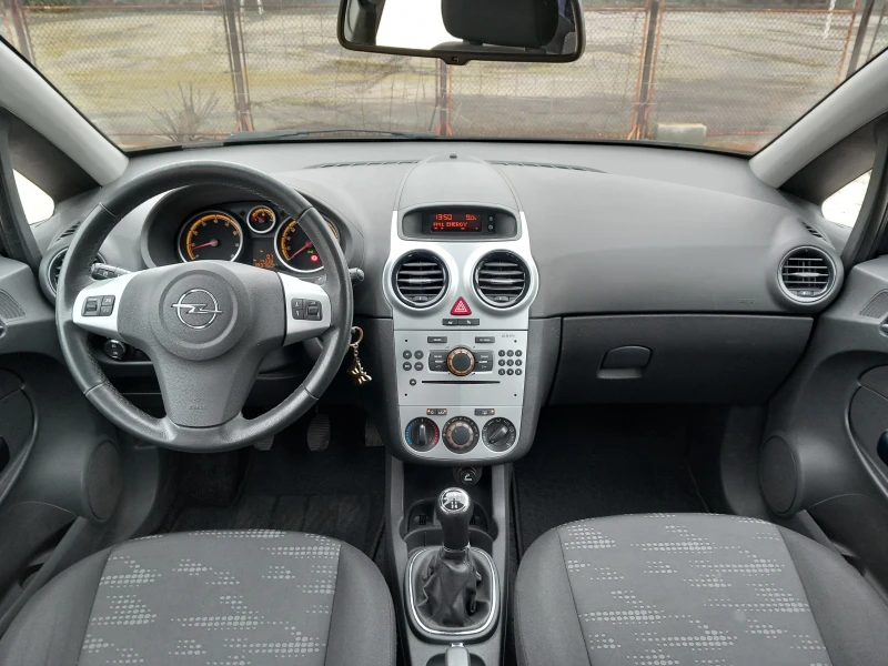 Opel Corsa 1.4 Facelift AC, снимка 9 - Автомобили и джипове - 53385982