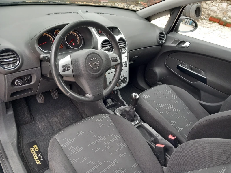 Opel Corsa 1.4 Facelift AC, снимка 10 - Автомобили и джипове - 53385982