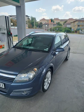 Opel Astra TWINPORT, снимка 1