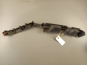 Водач (държач) задна броня ляв Опел Астра Н хечбек 