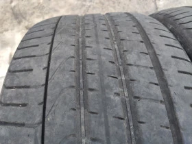 Гуми Летни 295/35R21, снимка 6 - Гуми и джанти - 43696477