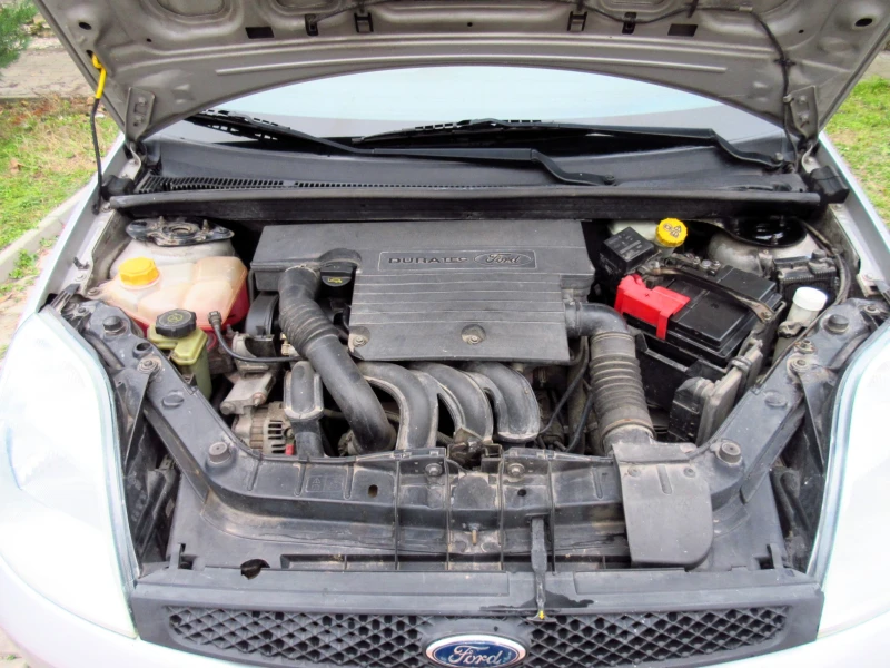 Ford Fiesta 1.4i, снимка 13 - Автомобили и джипове - 52858234