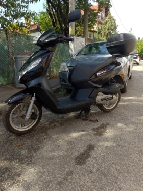 ������ Peugeot Kissbee