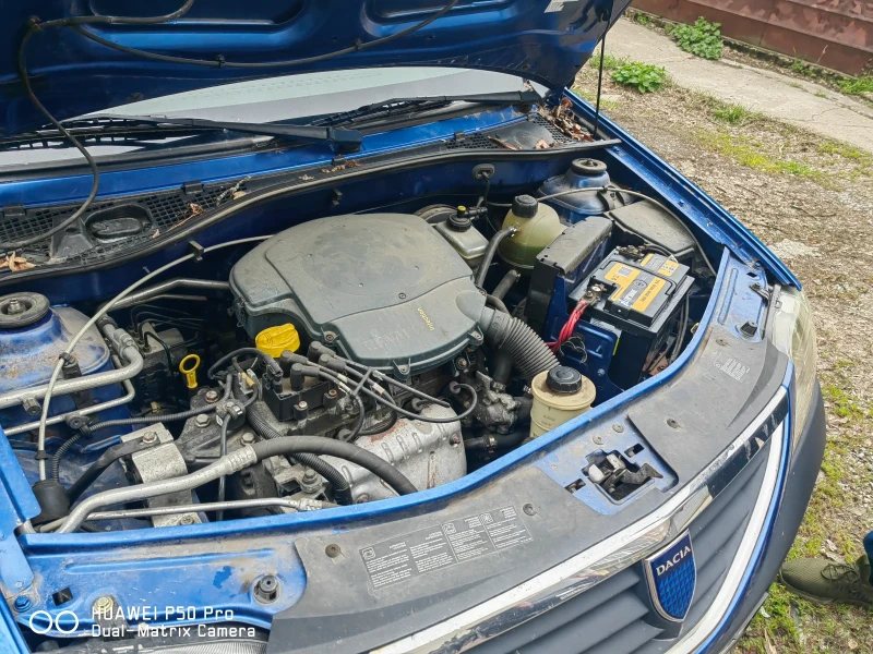 Dacia Logan, снимка 10 - Автомобили и джипове - 52361924