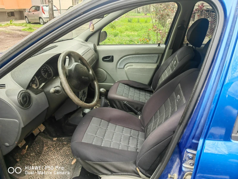 Dacia Logan, снимка 7 - Автомобили и джипове - 52361924