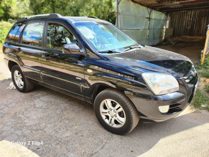 Kia Sportage 2.0 CRDi 4х4 АВТОМАТ, снимка 5 - Автомобили и джипове - 51785895