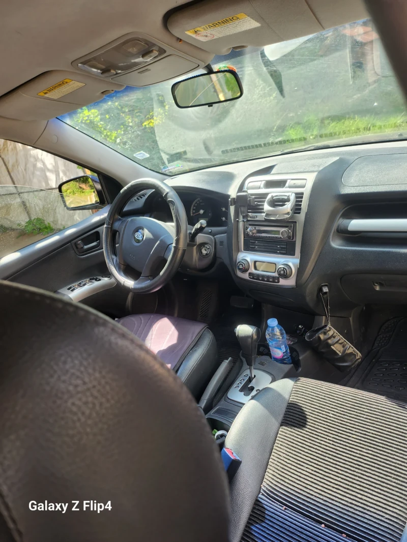 Kia Sportage 2.0 CRDi 4х4 АВТОМАТ, снимка 12 - Автомобили и джипове - 51785895