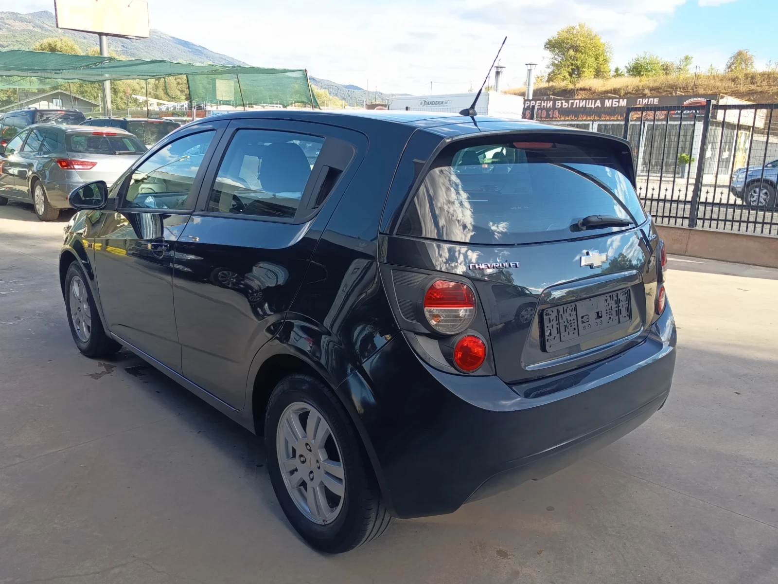 Chevrolet Aveo 1.2i , снимка 6 - Автомобили и джипове - 56235316