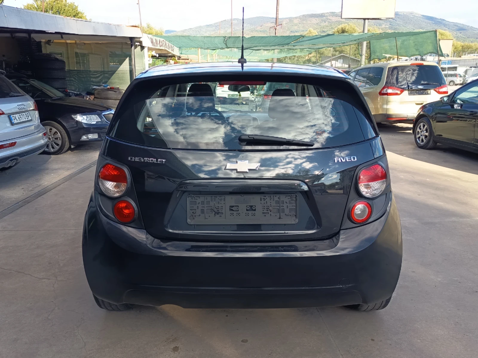 Chevrolet Aveo 1.2i , снимка 5 - Автомобили и джипове - 56235316