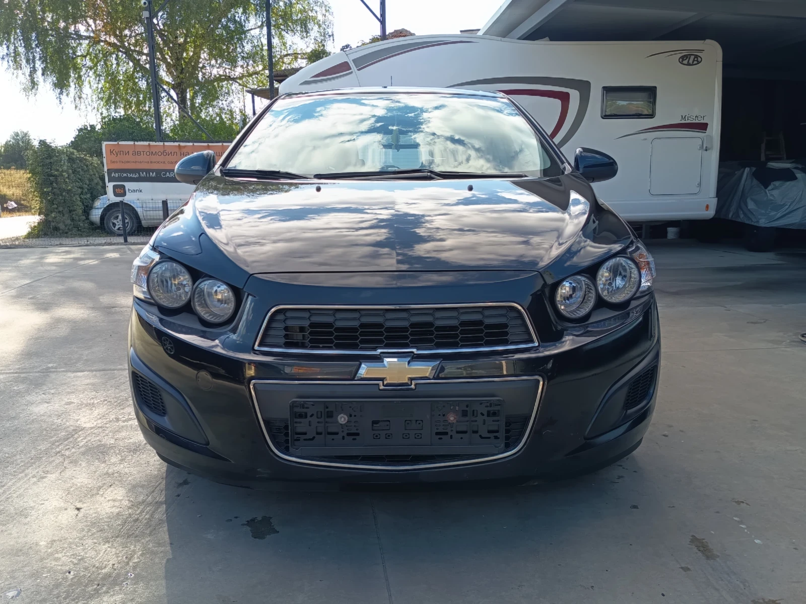 Chevrolet Aveo 1.2i , снимка 13 - Автомобили и джипове - 56235316