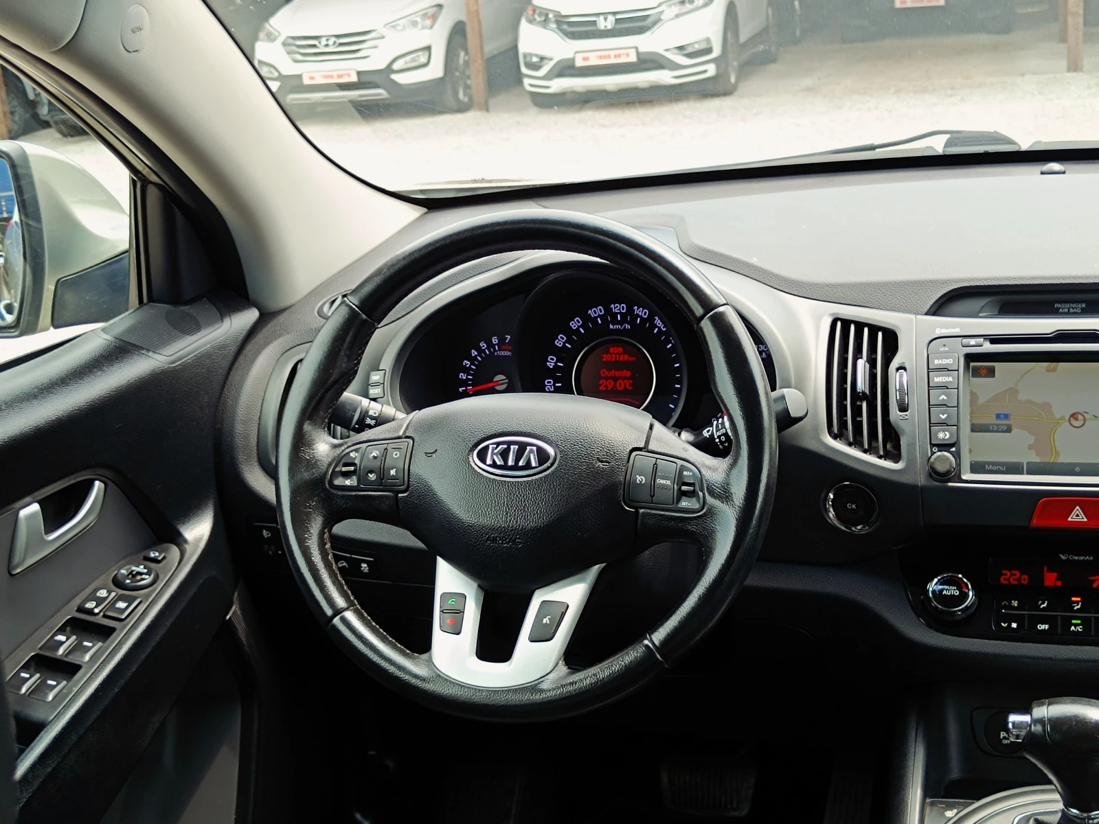 Kia Sportage 2.0 i* 4x4* АВТОМАТИК* NAVI* ПАНОРАМА* Keyless/Go*, снимка 12 - Автомобили и джипове - 55004017
