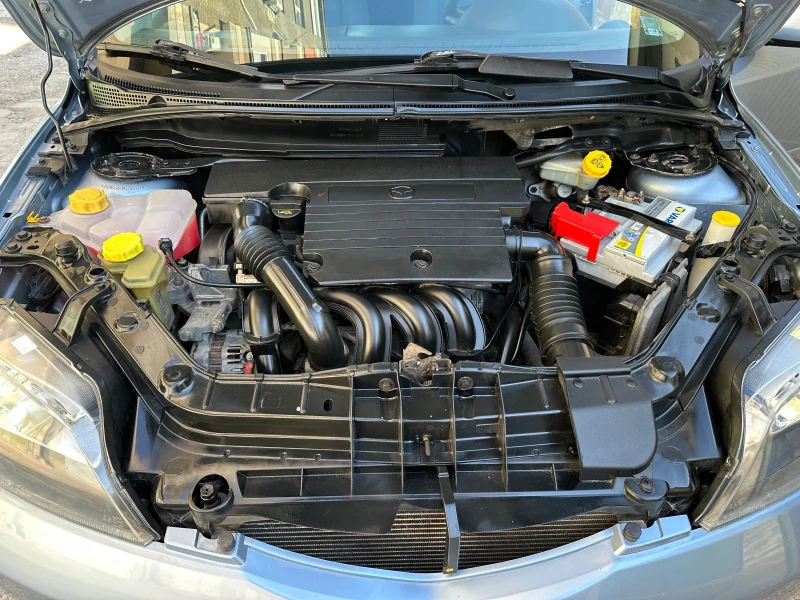 Mazda 2, снимка 11 - Автомобили и джипове - 47906404