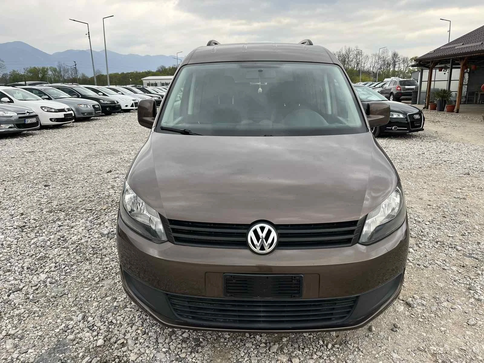 VW Caddy 1.2TSI 86кс 7 МЕСТА КЛИМАТРОНИК ВНОС ШВЕЙЦАРИЯ - изображение 2