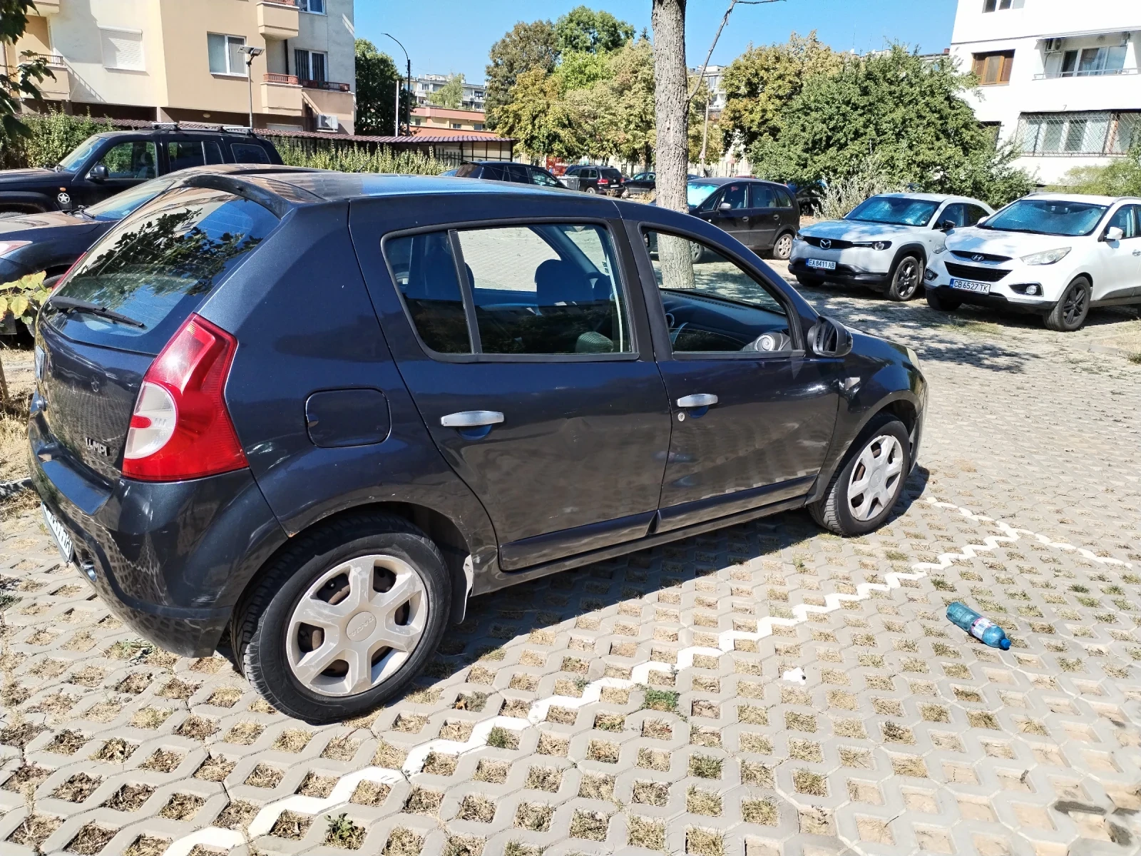 Dacia Sandero MPI , снимка 15 - Автомобили и джипове - 56113776