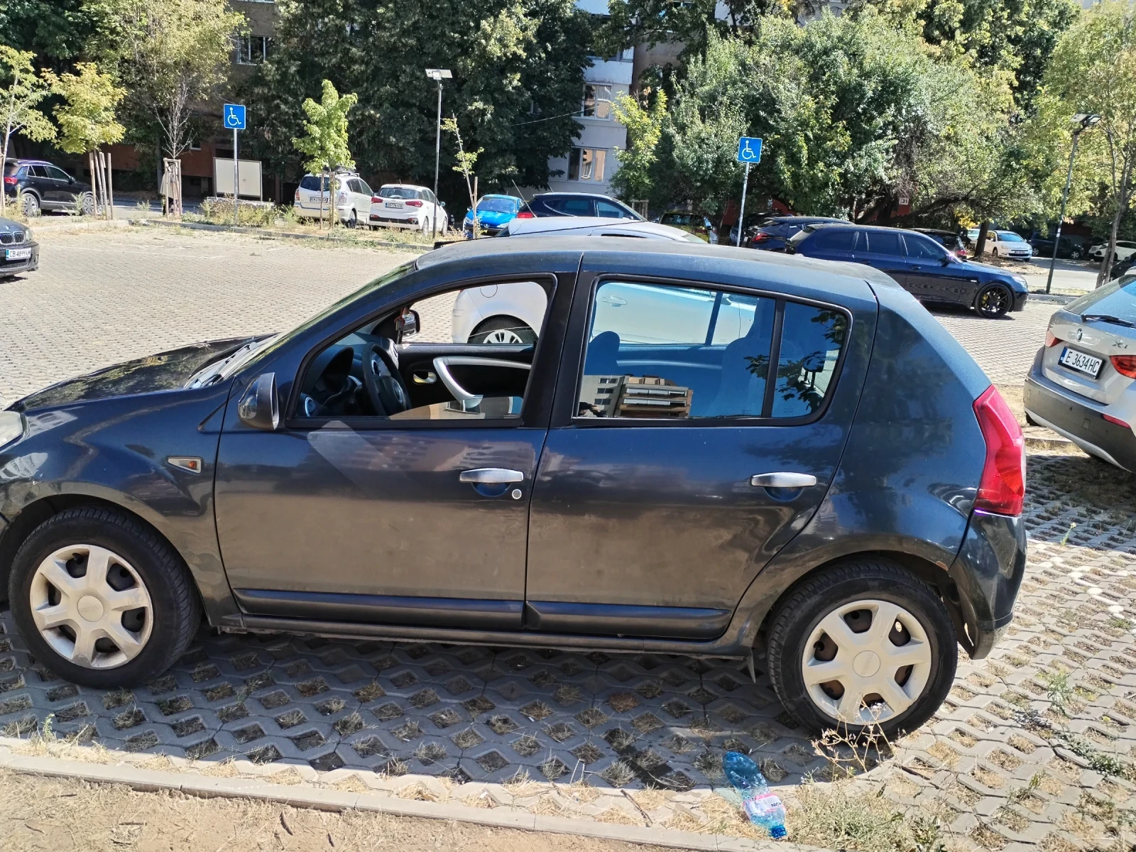 Dacia Sandero MPI , снимка 11 - Автомобили и джипове - 56113776