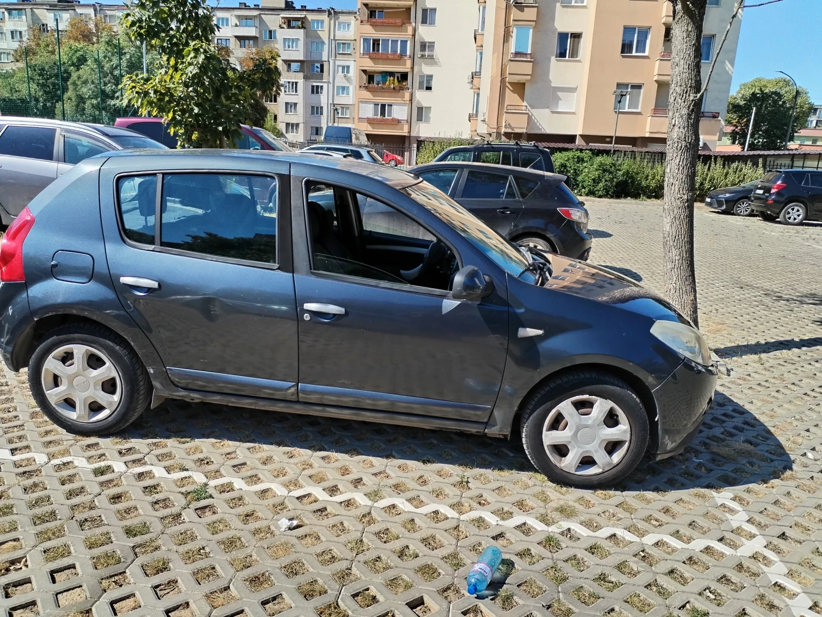 Dacia Sandero MPI , снимка 16 - Автомобили и джипове - 56113776