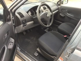 Suzuki Ignis 1.3VVT 90kc - [9] 