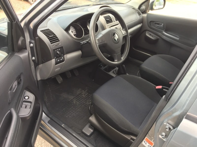 Suzuki Ignis 1.3VVT 90kc, снимка 8 - Автомобили и джипове - 46273644