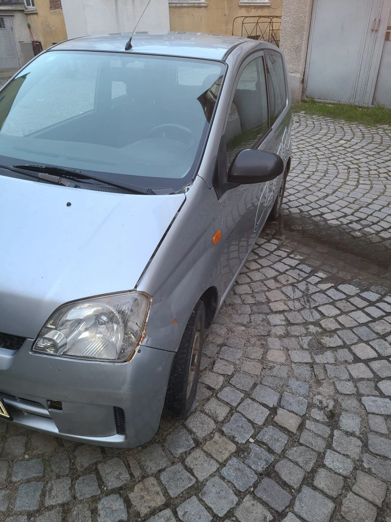 Daihatsu Cuore, снимка 5 - Автомобили и джипове - 53536616