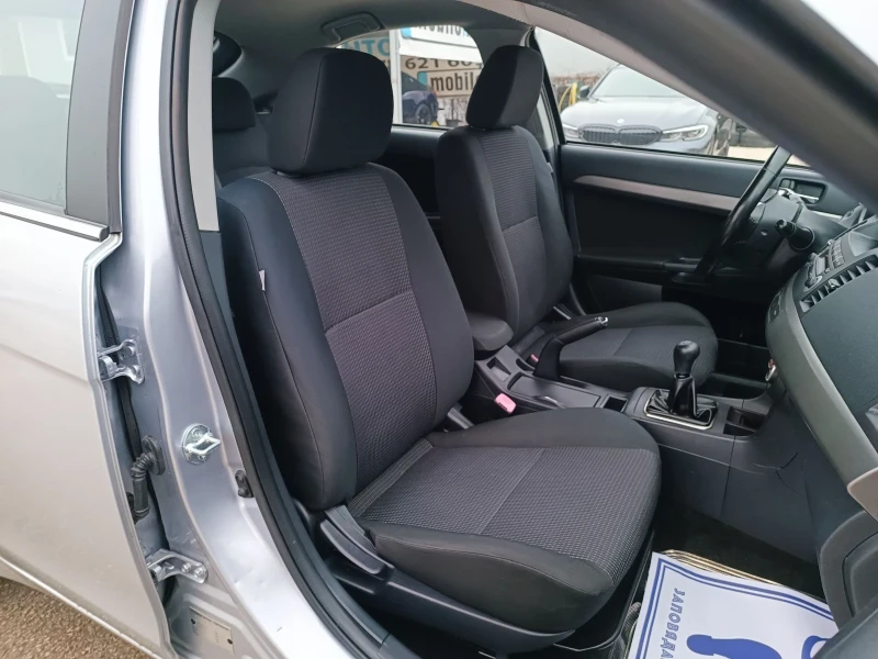 Mitsubishi Lancer 1.8i-143кс-ШВЕЙЦАРИЯ-РЪЧКА, снимка 12 - Автомобили и джипове - 53276291