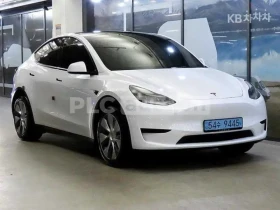 ������ Tesla Model Y
