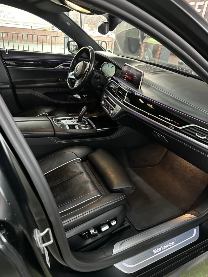 BMW 750, снимка 14 - Автомобили и джипове - 49486169