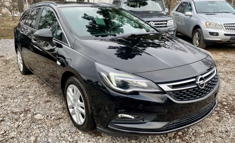 Opel Astra 1, 4 NAvi, снимка 8 - Автомобили и джипове - 48312254