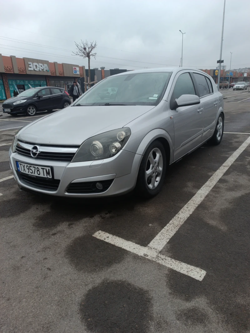 Opel Astra 2.0T, снимка 14 - Автомобили и джипове - 49310674