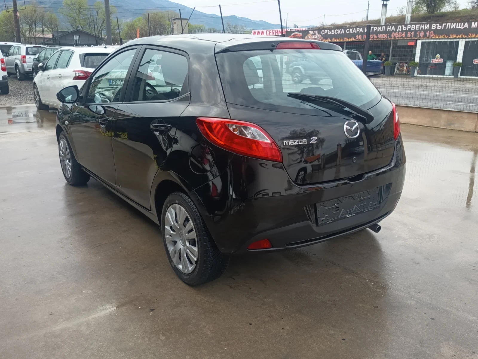 Mazda 2 1.3i, снимка 6 - Автомобили и джипове - 54274372