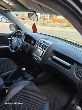Kia Sportage 140ps, снимка 9 - Автомобили и джипове - 53663958