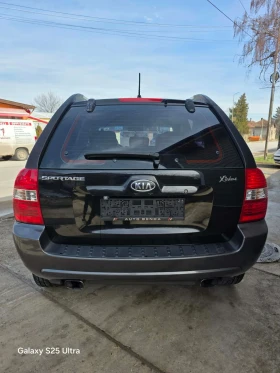 Kia Sportage 140ps, снимка 11 - Автомобили и джипове - 53663958