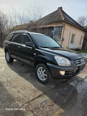 Kia Sportage 140ps, снимка 15 - Автомобили и джипове - 53663958