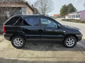 Kia Sportage 140ps, снимка 16 - Автомобили и джипове - 53663958