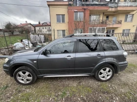 Mitsubishi Outlander - 2100 € / 4107.24 лв. - 32319591 2