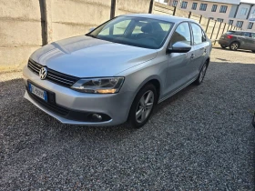 VW Jetta 1.6TDI NEW LINE  - 6900 € / 13495.23 лв. - 41405390 2