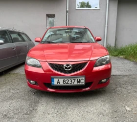 ������ Mazda 3