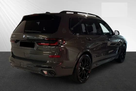 BMW X7 4.0d xDrive M-Pack - 76700 € / 150012.16 лв. - 67379921 3
