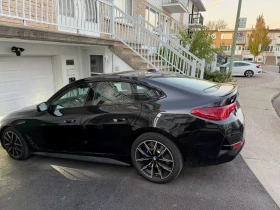 ������ BMW i4