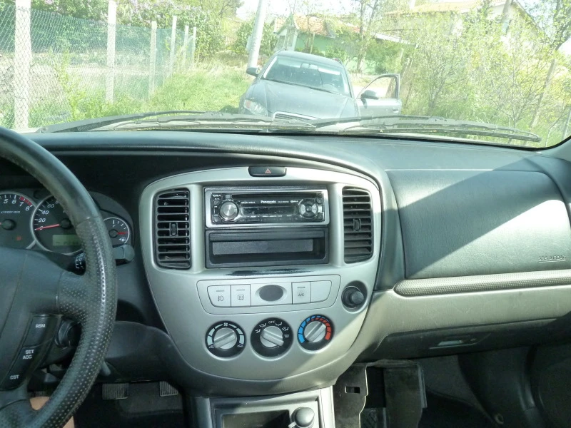 Mazda Tribute 2.3, снимка 12 - Автомобили и джипове - 45380116