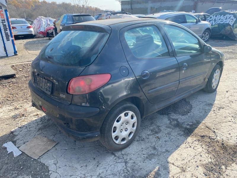 Peugeot 206 1.4, снимка 5 - Автомобили и джипове - 48136412