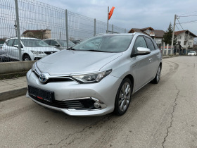 Обява за продажба на Toyota Auris 1.8i_Hibrid ~22 999 лв. - изображение 1