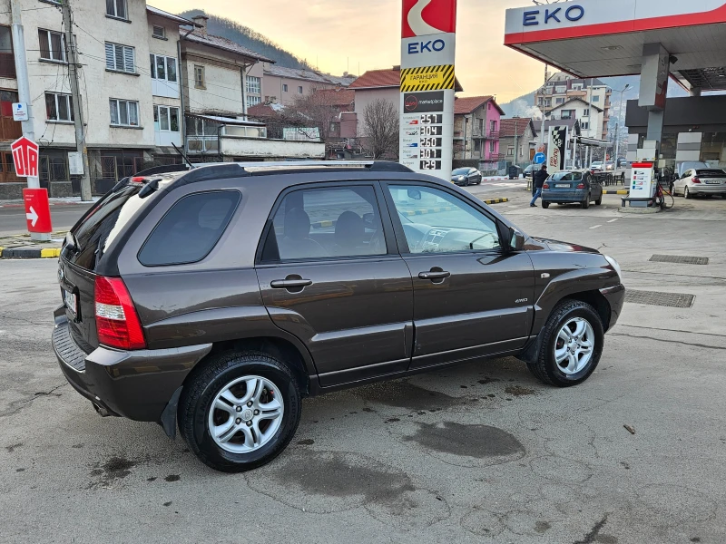 Kia Sportage 2.0 GAZ/4X4/KOJA/KLIMATRONIK, снимка 7 - Автомобили и джипове - 48563510