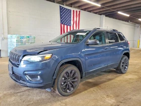 ������ Jeep Cherokee