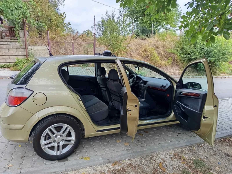 Opel Astra, снимка 8 - Автомобили и джипове - 52635002